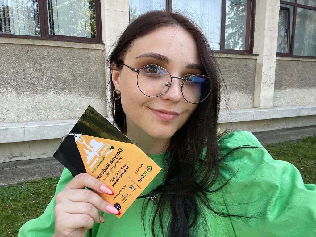 Daryna Rudenko with FOSS4G Europe conference badge